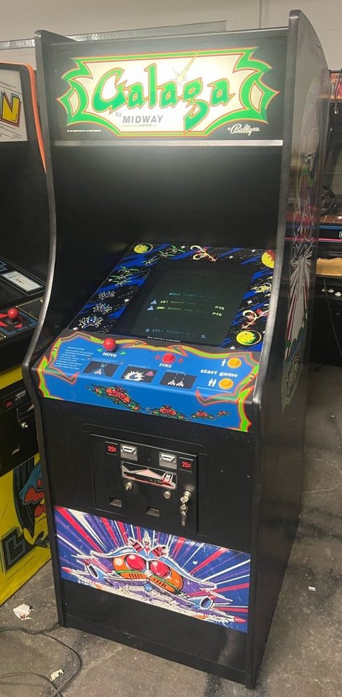 Galaga running on an arcade cabinet